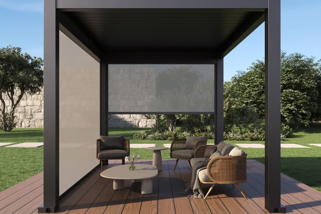 Modern aluminum pergola with retractable side screens creating a shaded outdoor lounge area on a wooden deck.