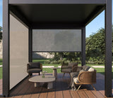 Modern aluminum pergola with retractable side screens creating a shaded outdoor lounge area on a wooden deck.