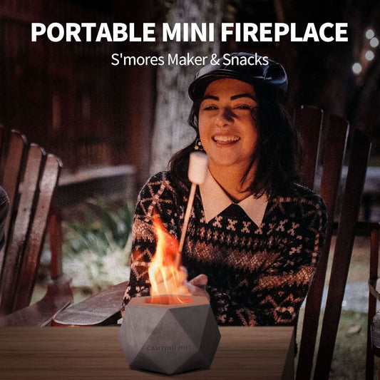 Portable mini tabletop fireplace used for roasting marshmallows and making s’mores outdoors