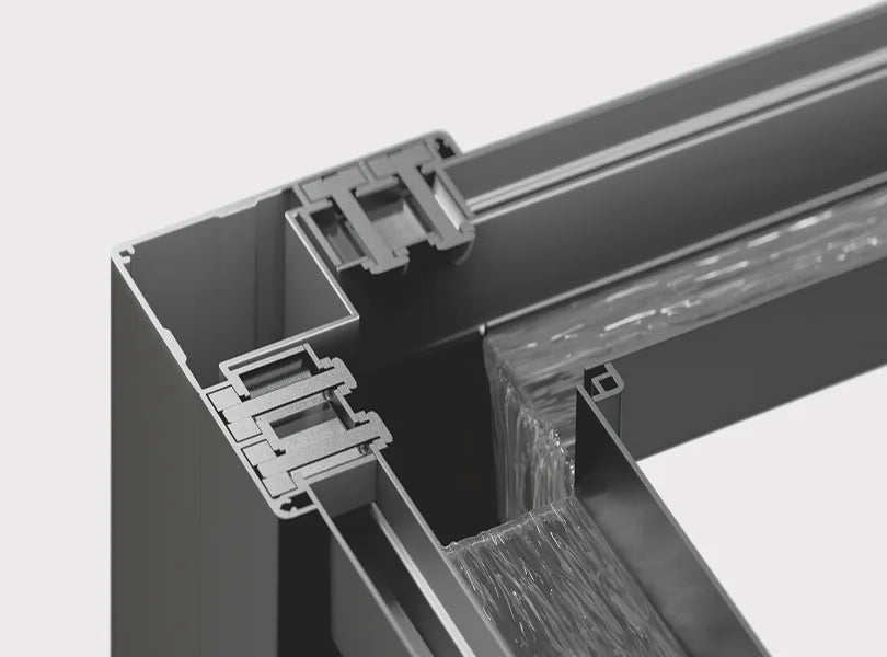 Hidden integrated gutters channel rain away invisibly. Clean lines, completely dry space.