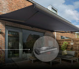 Retractable outdoor awning providing weather-resistant shade and rain protection for a backyard patio.
