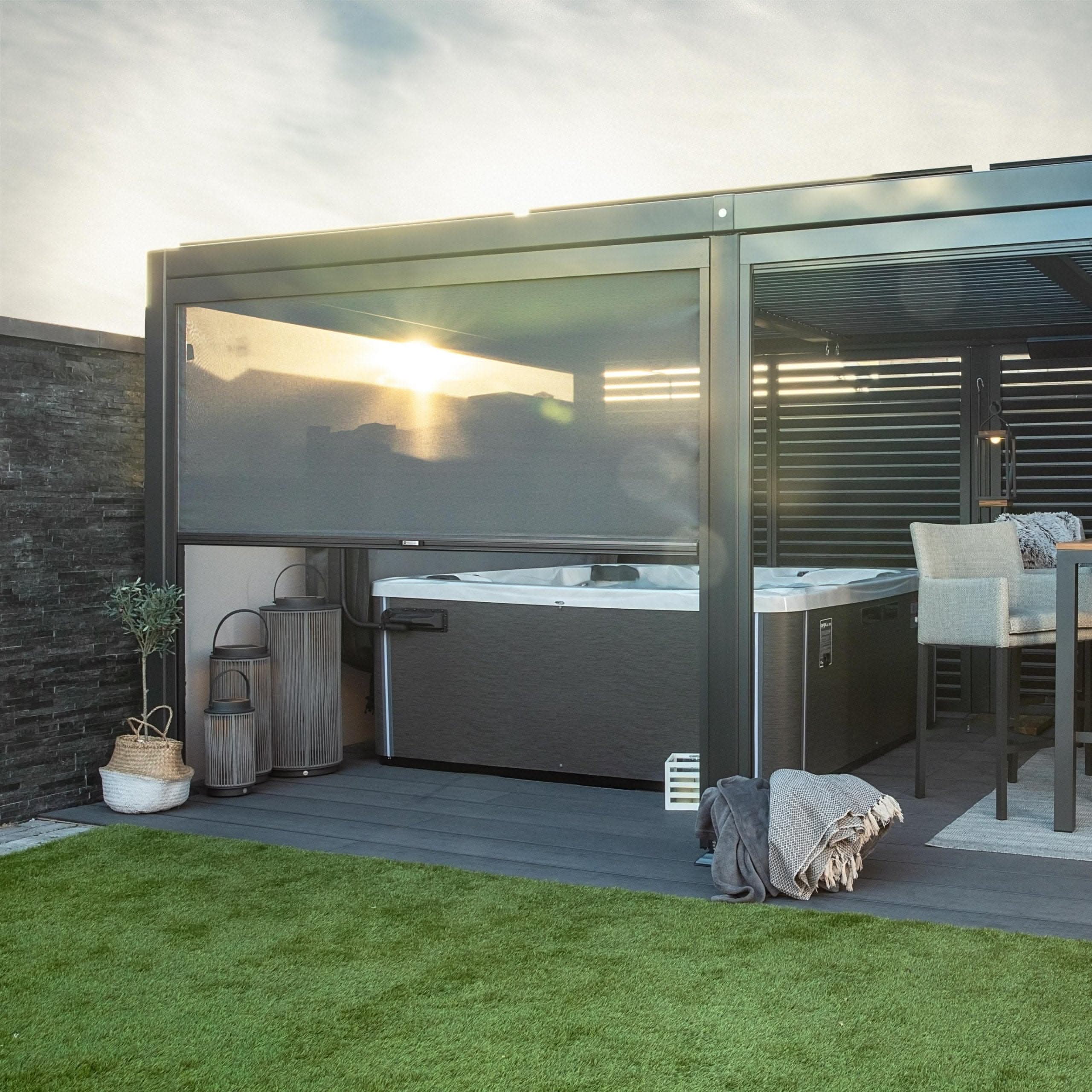 Modern pergola with retractable side screen creating a private outdoor spa and relaxation area